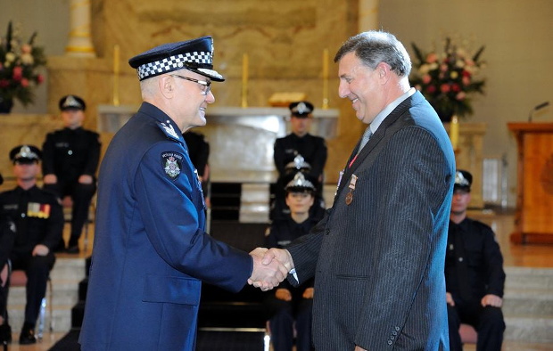 Chief Commissioner Ken Lay awarded former Sergeant Greg Maidment with a nomination for the Victoria Police Star at the Victoria Police Academy on 23 May via Victoria Police